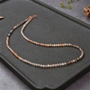 Heilstein & Edelstein-Strang - Kugeln, Mondstein (braun/bunt), facettiert, 03mm