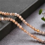 Heilstein & Edelstein-Strang - Kugeln, Mondstein (braun/bunt), facettiert, 03mm